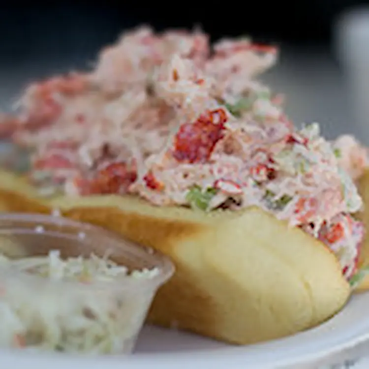 A classic lobster roll is the perfect choice for lunch, dinner, or an indulgent seaside snack.